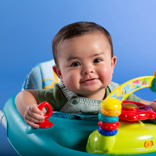 Infant boy wearing navy sweater. 